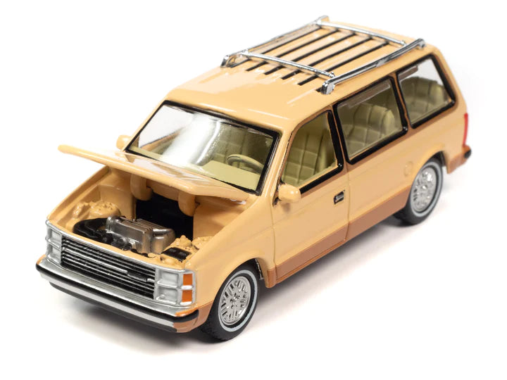 Auto World Mighty Minivans 1985 Plymouth Voyager Cream 1:64