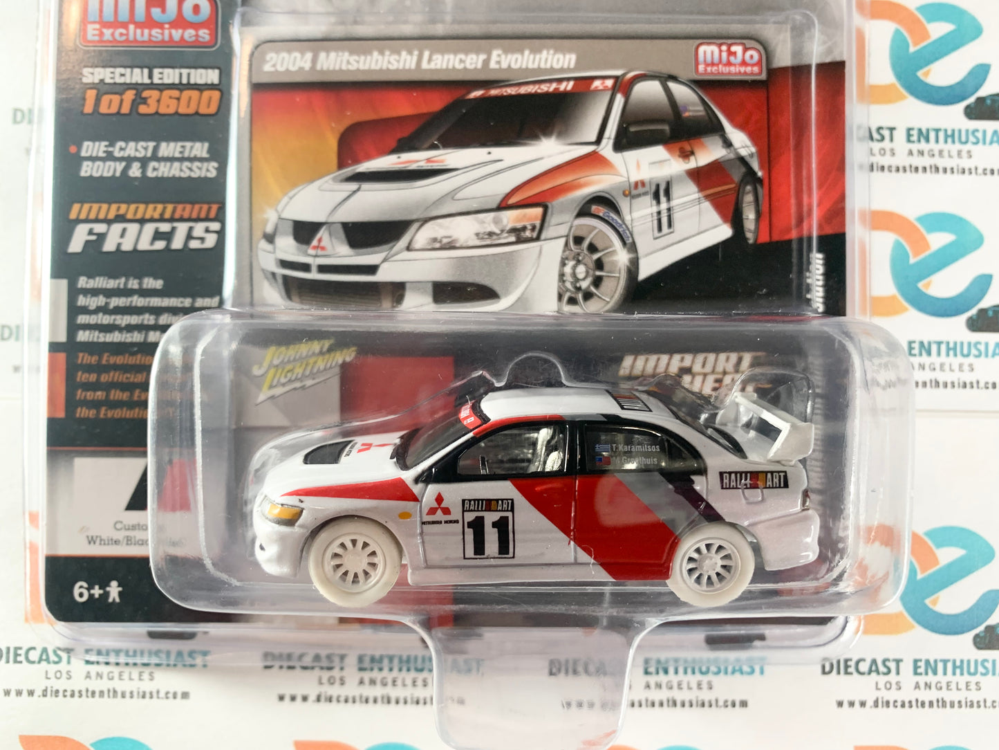 CHASE WHITE LIGHTNING Johnny Lightning Mijo Exclusives Ralli Art 2004 Mitsubishi Lancer Evolution White Black Red 1:64