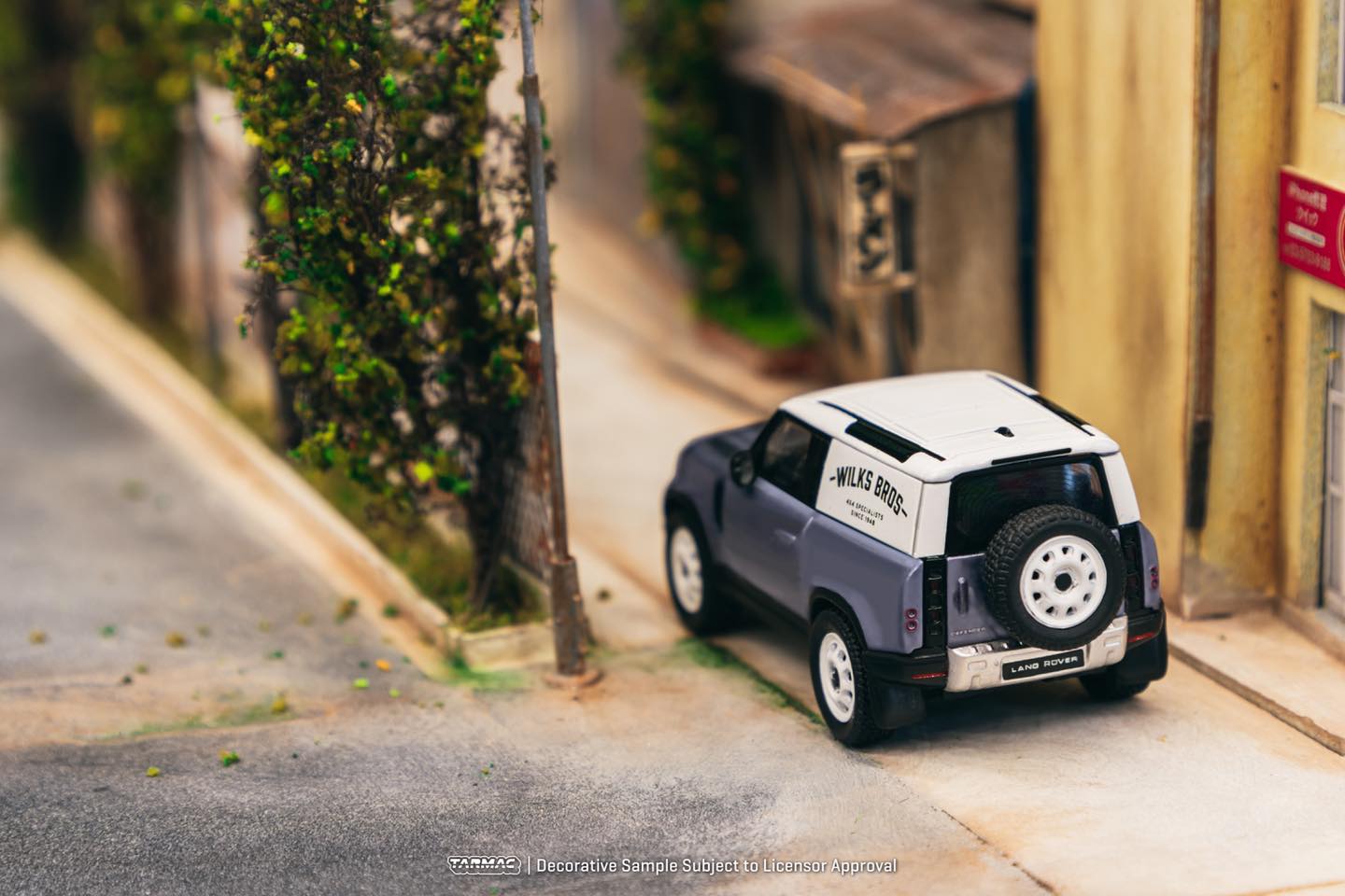 Tarmac Works Land Rover Defender 90 Wilks Bros Blue 1:64