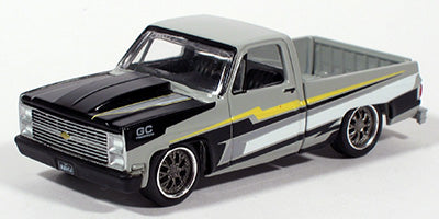 Auto World Exclusives The Heartbeat of America 1983 Chevy Silverado Fleetside Baba Yaga Grey 1:64