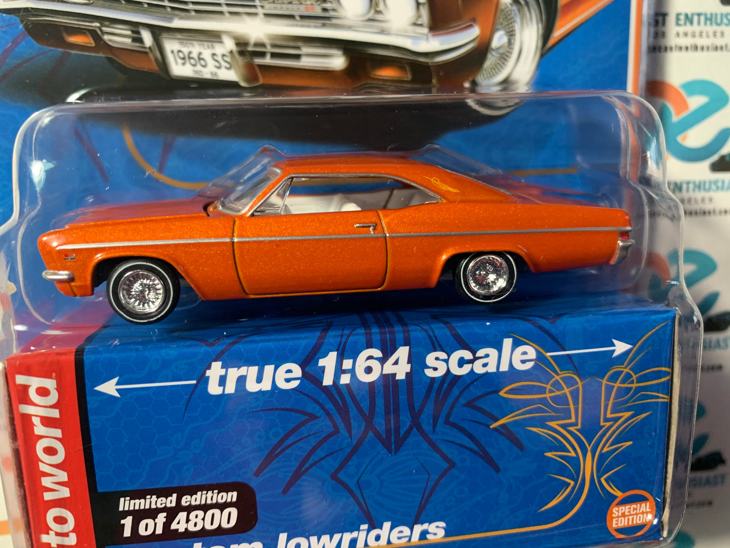 Auto World Mijo Exclusive Custom Lowriders 1966 Chevrolet Impala SS Orange 1:64