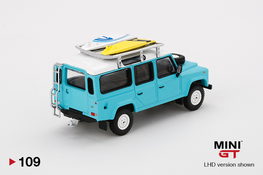 Mini GT Mijo Exclusives 109 Land Rover Defender 110 Light Blue with Surfboard 1:64