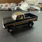 LOOSE Auto World Exclusives 1973 Chevy Cheyenne K10 Fleetside Black Gold 1:64