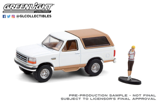 Greenlight The Hobby Shop 1996 Ford Bronco Bauer with Backpacker 1:64
