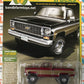 CHASE Auto World Exclusives 1973 Chevy Cheyenne K10 Fleetside Black Gold 1:64