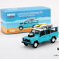 Mini GT Mijo Exclusives 109 Land Rover Defender 110 Light Blue with Surfboard 1:64