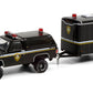 Greenlight Hitch & Tow 1990 Chevrolet K5 Blazer Utica New York Police Small Cargo Trailer Black 1:64